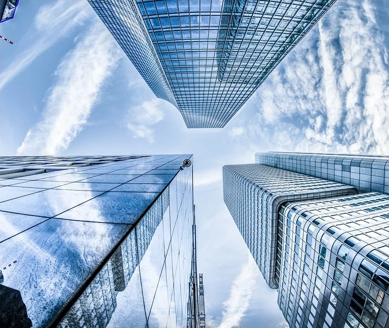 Tall building and sky viewed from below